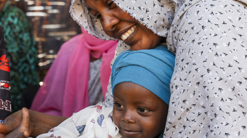 En mamma och bebis, Tcad.