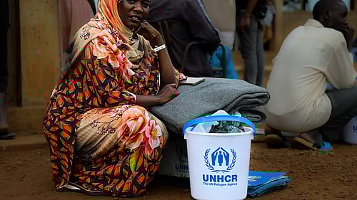 En kvinna som flytt över gränsen till Sydsudan och fått hjälp av UNHCR.