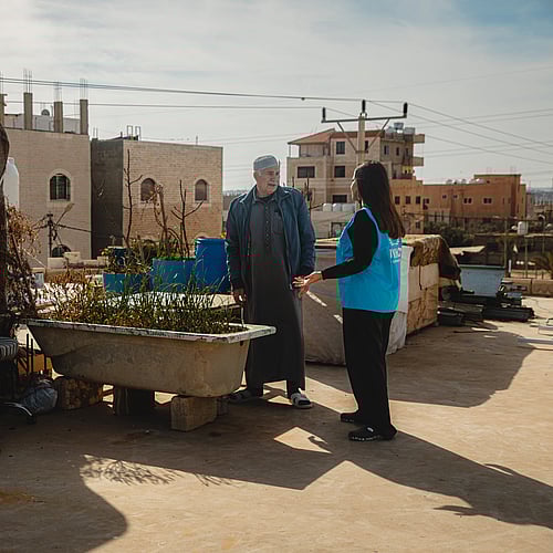 En familj på flykt från Syrien förbereder sig för Ramadan på ett hustak i Jordanien.