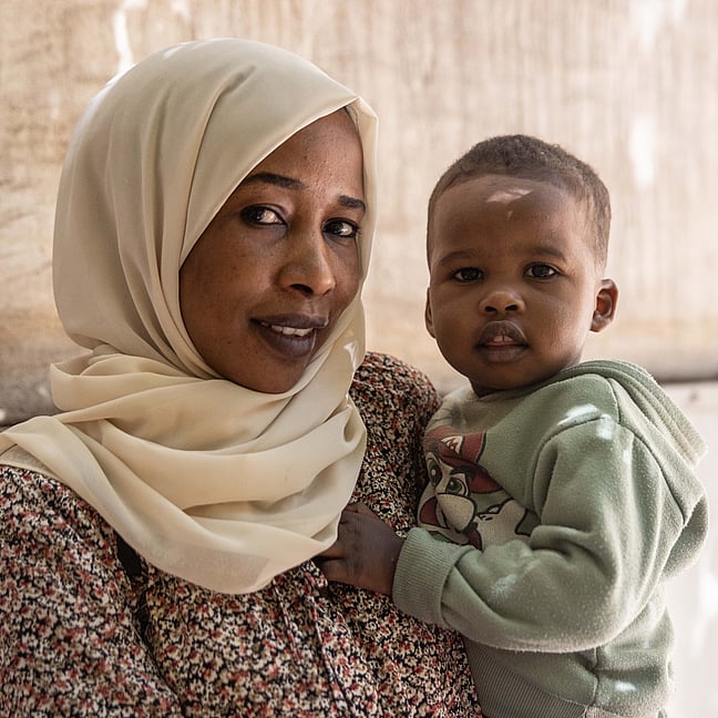 En kvinna och hennes barn.