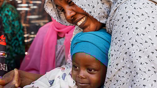 En mamma och bebis, Tcad.