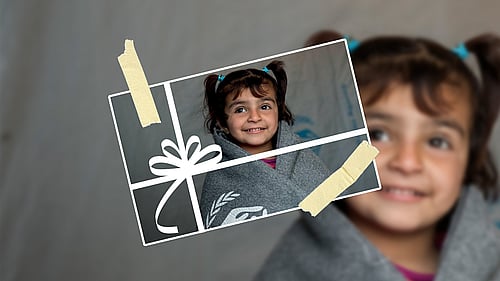 Gåvobevis med bild på en flicka i en filt.